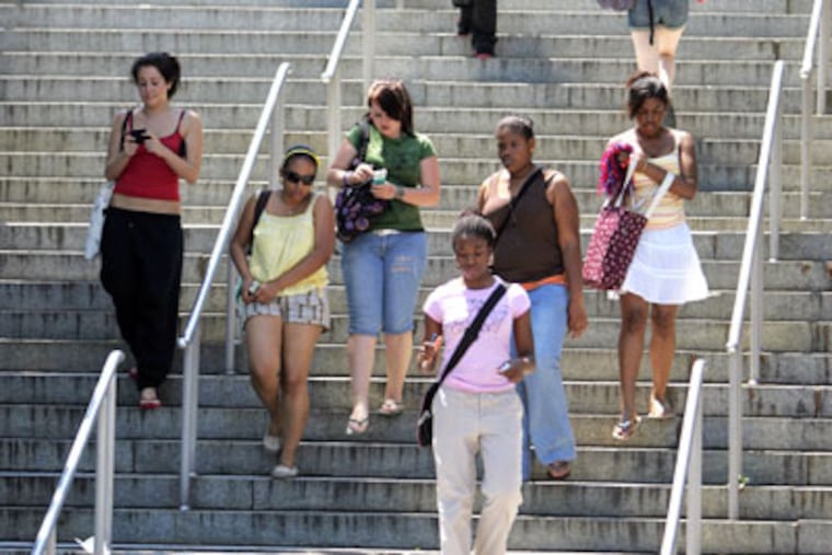 Students stream out of Girls High in Philadelphia. (David Swanson/Inquirer)