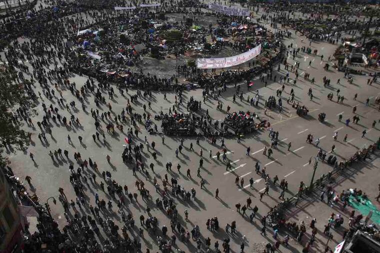 Protesters gathered in Cairo's Tahrir Square. "What happens there determines what happens in Egypt," said Swarthmore professor Farha Ghannam. "It's hard to believe that one small space could mean so much, but that's what's happening now."