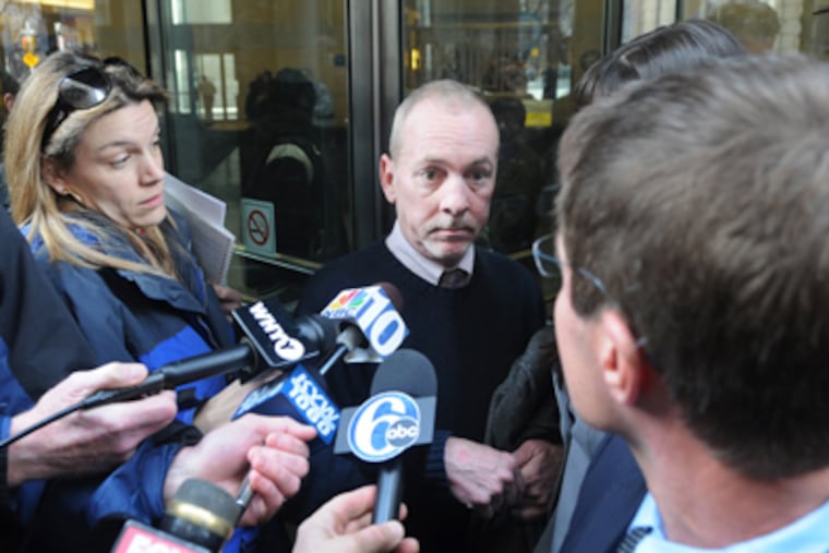 The Rev. James Brennan leaves the Criminal Justice Center after a hearing where prosecutors argued for going straight to trial. (Sarah J. Glover / Staff Photographer)