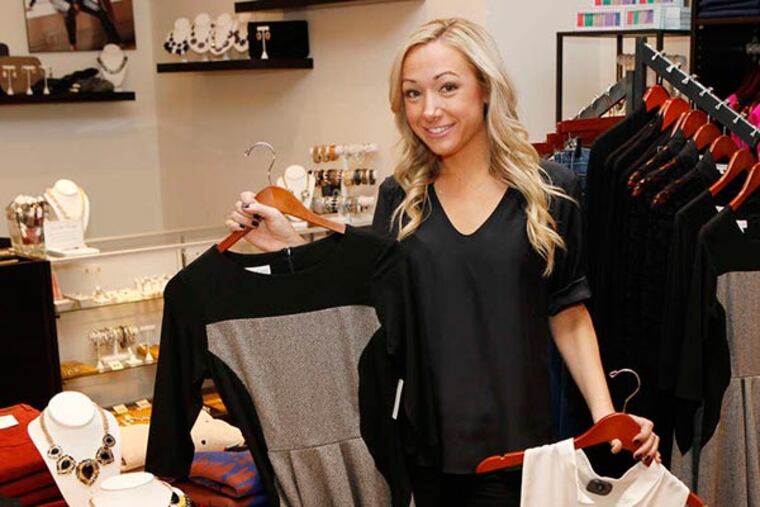 Liz Rymar, owner and designer of Ellelaluri, in Liberty Place in Philadelphia on November 21, 2013. ( MICHAEL S. WIRTZ / Staff Photographer )