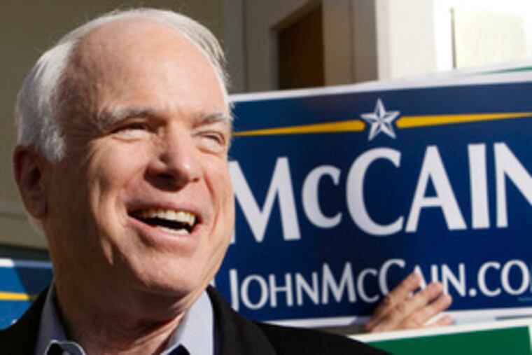 Arizona Sen. John McCain talks with reporters early yesterday at a polling station in St. Petersburg, Fla. Last night he said of his win: "It shows one thing: I'm the conservative leader who can unite the party."