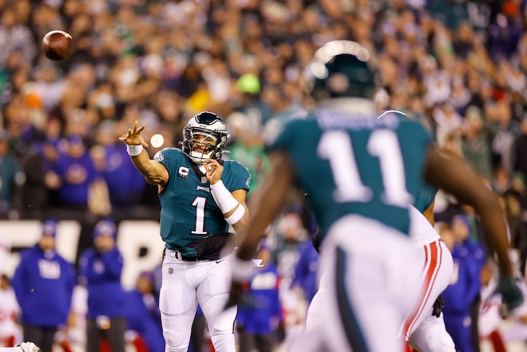 Philadelphia Eagles quarterback Jalen Hurts throws to Philadelphia Eagles wide receiver A.J. Brown in the first quarter of the divisional playoff game against the Giants at Lincoln Financial Field on Saturday, Jan. 21, 2023, in Philadelphia.
