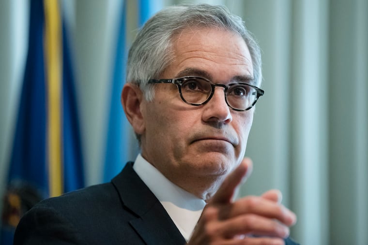 Philadelphia District Attorney Larry Krasner speaks with members of the media during a news conference in Philadelphia, Tuesday, Sept. 4, 2018. Krasner said Ryan Pownall, a fired white Philadelphia police officer, has been charged with criminal homicide for fatally shooting a black man in the back after a confrontation over a dirt bike. (AP Photo/Matt Rourke)