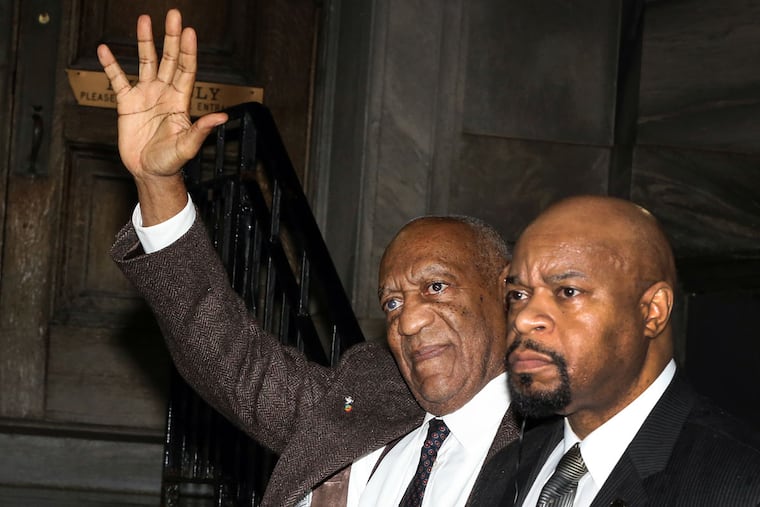 Bill Cosby waves to the public while leaving the Montgomery County Courthouse after his hearing in Norristown on Wednesday, Feb. 3, 2016.