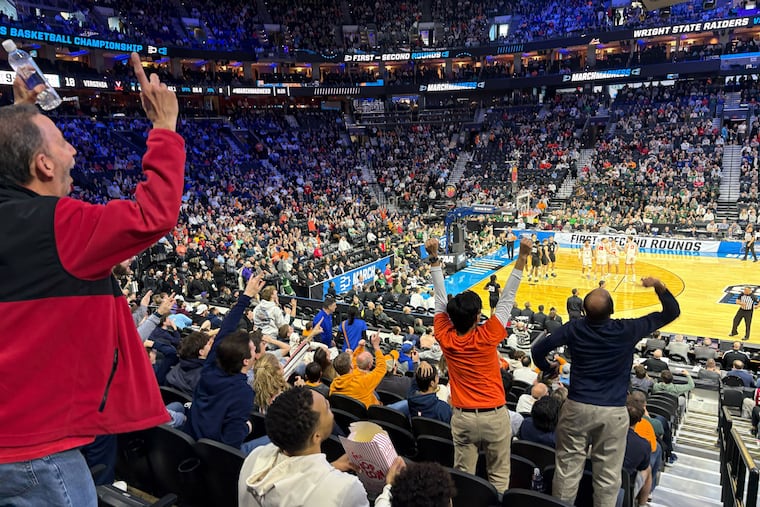 Fans cheer as Wright State takes on Virginia in the NCAA men's basketball tournament at Xfinity Mobile Arena. The NCAA Tournament is as popular as ever.