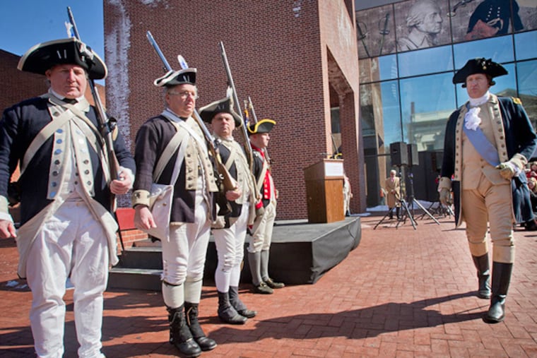 American revolutionary war re-enactors during ceremony announcing the construction of the Museum of the American Revolution. Opening salvo for Museum of the American Revolution held at 3rd and Chestnut St. in Philadelphia future home of this museum. Photograph from Wednesday morning March 5, 2014. ( ALEJANDRO A. ALVAREZ / STAFF PHOTOGRAPHER )