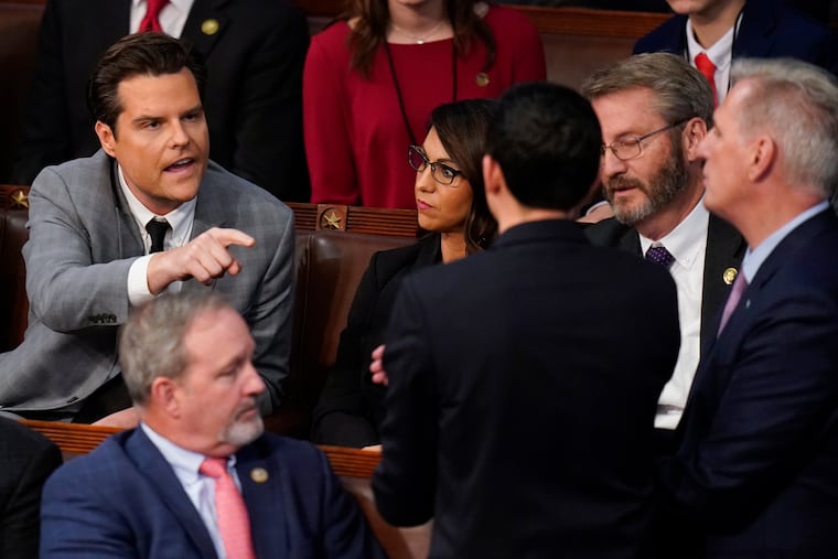Rep. Matt Gaetz (R., Fla.) talks to Rep. Kevin McCarthy (R. Calif.) after Gaetz voted "present" in the House chamber as the House meets for the fourth day to elect a speaker and convene the 118th Congress in Washington Friday.