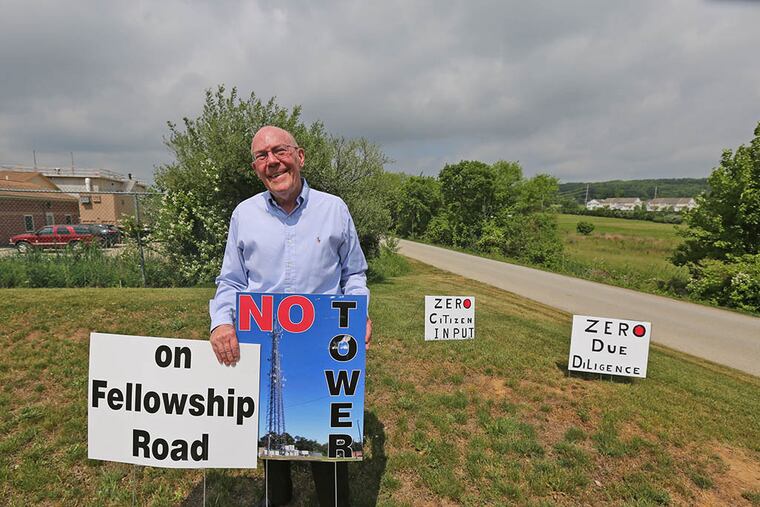 Raymond Erfle near the site of the planned radio tower, which opponents say will lower home prices. (DAVID SWANSON / Staff Photographer)