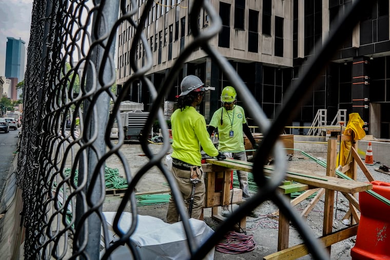 Construction workers at a site on in New York City last month.