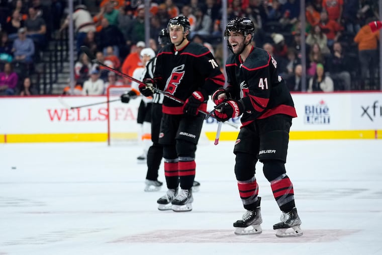 Carolina Hurricanes defenseman Shayne Gostisbehere, right, is in a position to go to the playoffs for the first time since 2020 when he was a member of the Flyers.