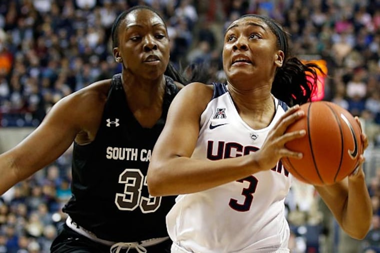 Connecticut Huskies forward Morgan Tuck (3) drives the ball against South Carolina Gamecocks center Elem Ibiam (33) in the first half at Harry A. Gampel Pavilion. UConn defeated South Carolina 87-62. (David Butler II/USA Today)