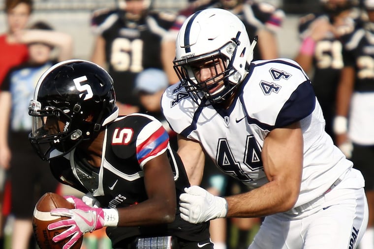 Episcopal Academy’s Milton Mamula (44) sacks Germantown Academy quarterback Lacey Snowden (5) in an Inter-Ac League contest last season.