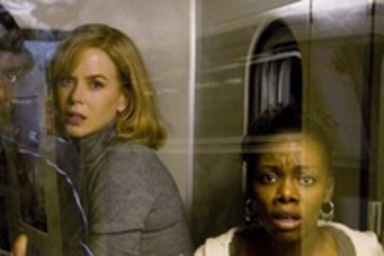 Nicole Kidman (center) portrays a psychiatrist in Oliver Hirschbiegel's explosive, if disappointing, thriller, "The Invasion," which opened Friday.