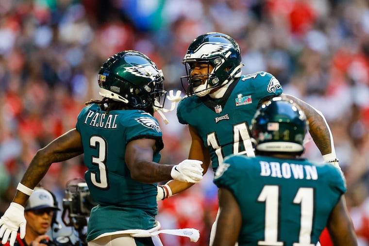 Eagles wide receiver Zach Pascal, Kenneth Gainwell and AJ Brown celebrate in the first quarter of Super Bowl LVII against the Kansas City Chiefs at State Farm Stadium on Sunday, Feb. 12, 2023, in Glendale, AZ.