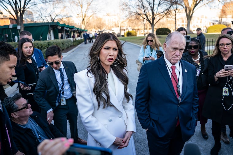 Homeland Security Secretary Kristi L. Noem and White House border czar Tom Homan speak to reporters at the White House on Jan. 29.