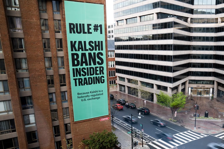 An advertisement for prediction market platform Kalshi hangs at 13th and L Streets in northwest Washington on April 1.