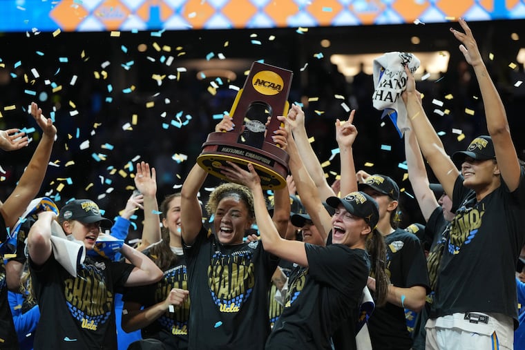 UCLA players celebrate after the Bruins won the national championship in dominant fashion.