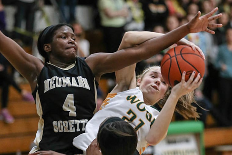 Neumann-Goretti's Alisha Kebbe (4) tries to block the shot of Archbishop Wood's Bailey Greenberg. (Steven M. Falk/Staff Photographer)