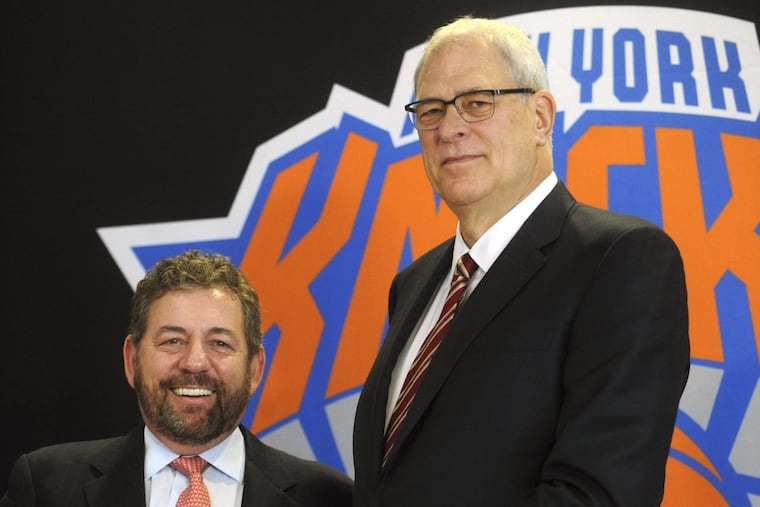 James Dolan and Phil Jackson attend a Knicks news conference in 2014, when Jackson was named team president