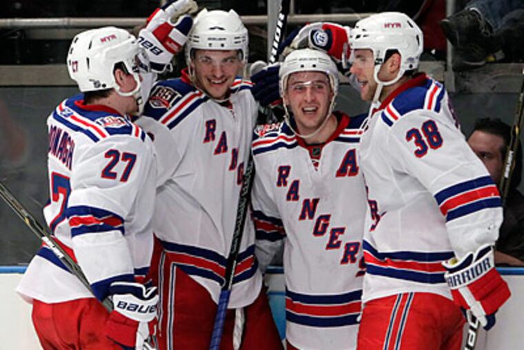 The Rangers chased chased Flyers goaltender Brian Boucher with 13:32 left in the second period. (Seth Wenig/AP)