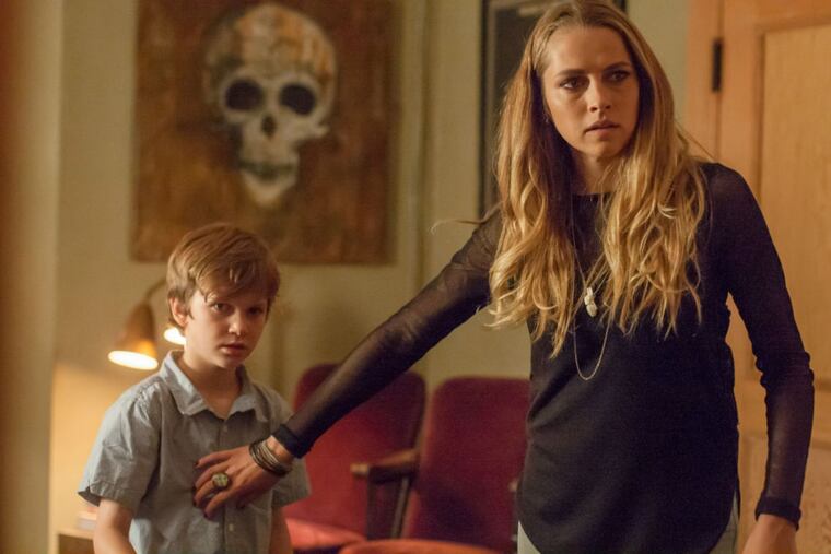 Gabriel Bateman and Teresa Palmer in "Lights Out"