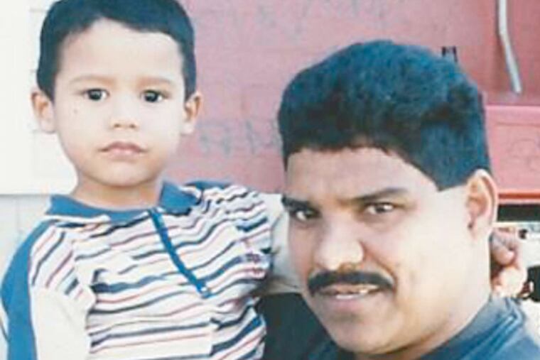 Hector Ivan Colon at age 2 with his father.