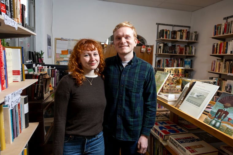 Ariel Censor, 27, originally from New York City, and Simon Censor, 29, originally of Providence, R.I., owners of Little Yenta Books, pose for a portrait in their small bookshop in Philadelphia, Pa., on Friday, Feb. 13, 2026.