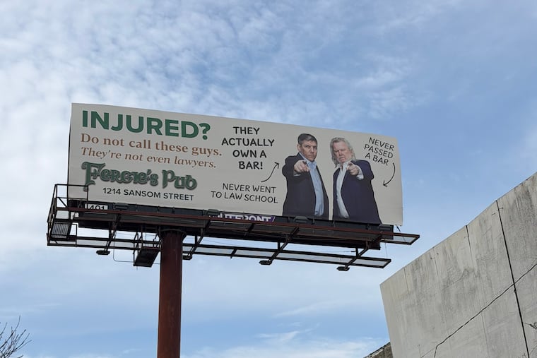 A new I-95 billboard in Fishtown advertises Fergie's Pub, while having a little "craic" with the rise of personal injury attorney ads.