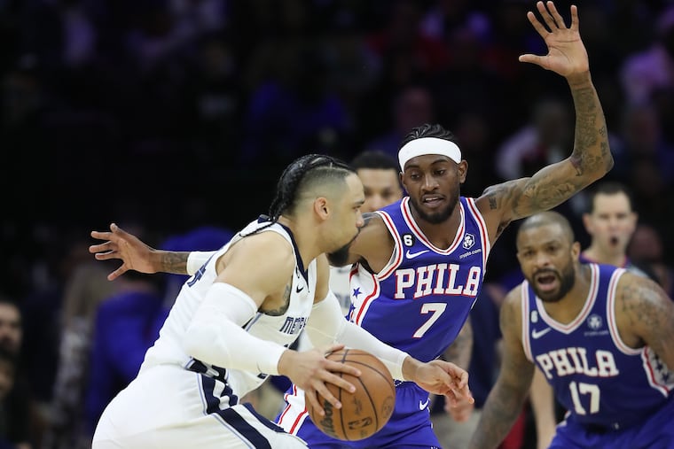 Sixers forward Jalen McDaniels defends Memphis Grizzlies forward Dillon Brooks on Thursday, February 23, 2023 in Philadelphia.