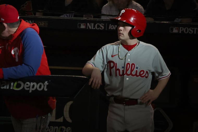 Phillies batboy Adam Crognale watches the Phillies play the Diamondbacks in Game 3 of the baseball NL Championship Series on Oct. 19, 2023, at Chase Field in Phoenix.