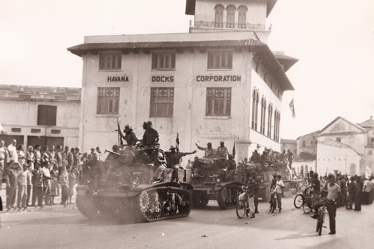 Cuban revolutionaries taking over the Havana Docks Corporation facilities in 1960.