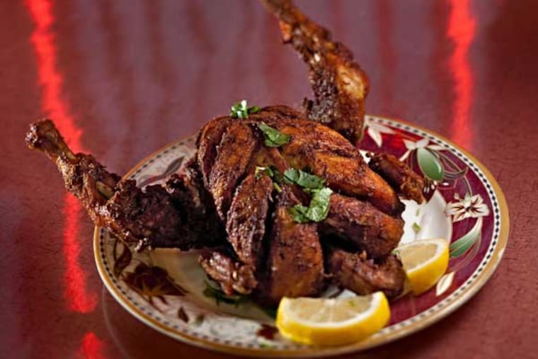 Exotically spiced Chargha chicken at Wah-Gi-Wah, a modest but tidy Pakistani kebab house in the Spruce Hill section of West Philly.