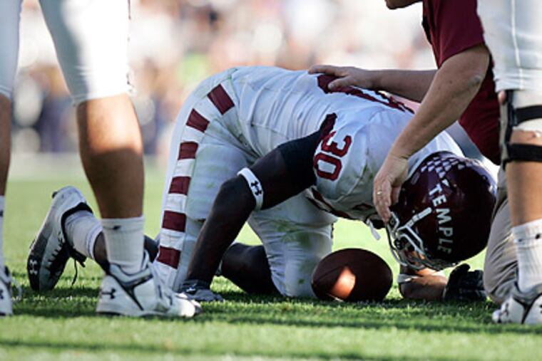 Bernard Pierce suffered a leg injury in Saturday's game at Penn State. (David Swanson/Staff Photographer)