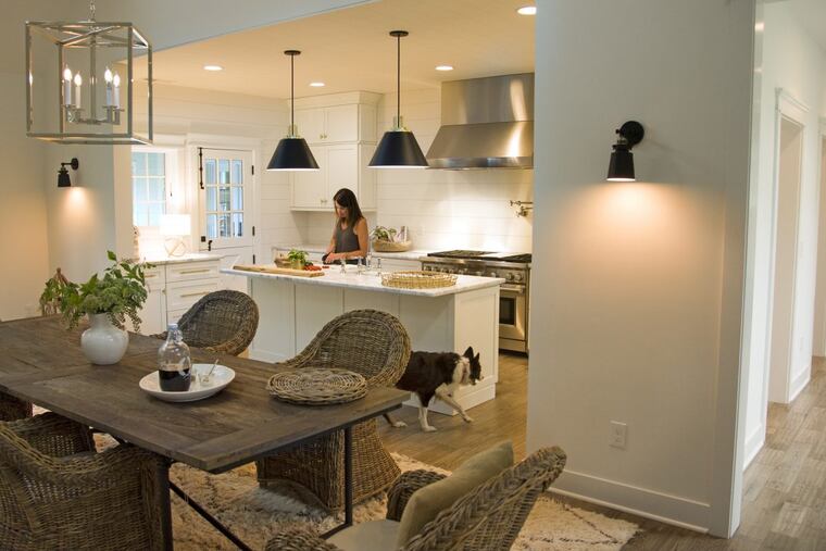 Danielle Marinelli works in the kitchen of her Doylestown home.