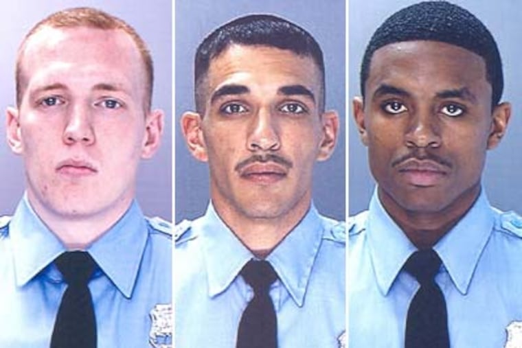 Philadelphia police officers (from left) Robert Snyder, James Venziale, and Mark Williams have been charged with planning to steal heroin and sell it to a drug dealer.
