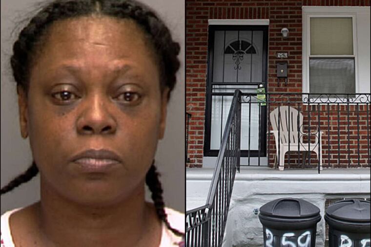 Regina Bennett was arrested after police say they found a woman with special needs bound to a bed in the basement of a home on Linton Street near 2nd in Olney. (Yong Kim/Staff)