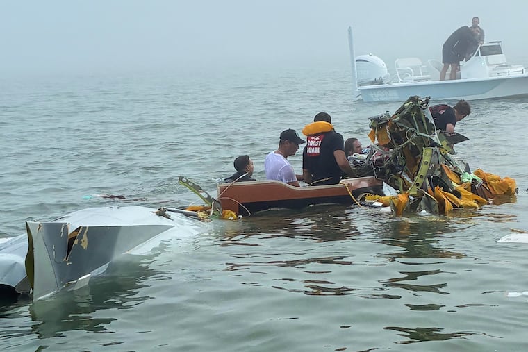 In this image provided by Sky Decker Jr., authorities and volunteers respond to a Mexican Navy plane crash near Galveston, Texas, Monday, Dec. 22, 2025. (Sky Decker Jr. via AP)null