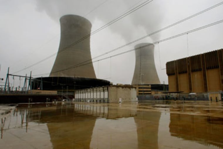 At the Exelon Nuclear Limerick Generating Station, spent fuel is stored in a secure building at bottom left. In the background are the cooling towers. ( Michael S. Wirtz / Staff Photographer )