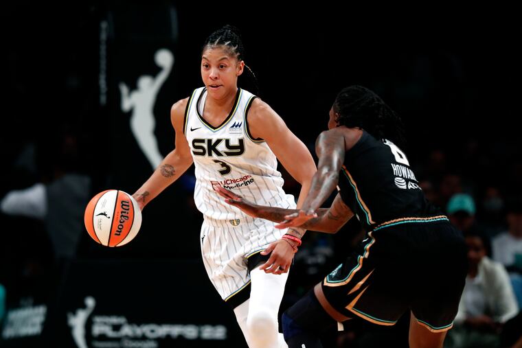 Chicago Sky forward Candace Parker (3) drives to the basket against New York Liberty forward Natasha Howard (6) during the first half of a WNBA basketball playoff game Tuesday, Aug. 23, 2022, in New York. (AP Photo/Noah K. Murray)