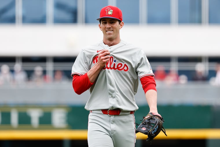 Rookie Andrew Painter walks to the Phillies dugout after finishing the third inning of his spring training start against the Atlanta Braves.