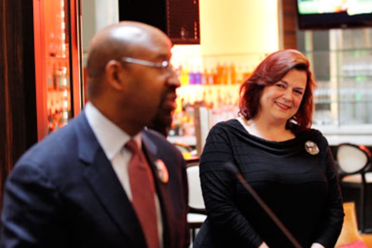 Philadelphia Mayor Michael Nutter speaks in support of the Philadelphia Orchestra in the lobby of the Ritz Carleton as orchestra president Allison Vulgamore looks on Wednesday afternoon, May 18, 2011. (Laurence Kesterson / Staff Photographer)