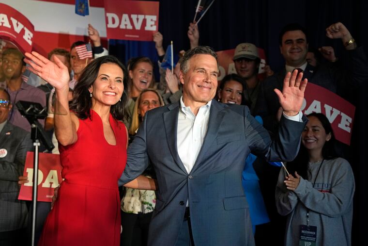 Republican David McCormick, with his wife, Dina Powell, arrives at the Heinz History Center to announce that he will enter Pennsylvania's U.S. Senate race and make his second bid for the office, this time to take on Democratic Sen. Bob Casey.