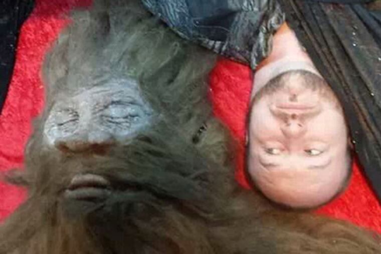 Bigfoot hunter Rick Dyer with creature he says he shot in San Antonio in Sept. 2012. This was taken after it was scientifically studied and taxonomied.