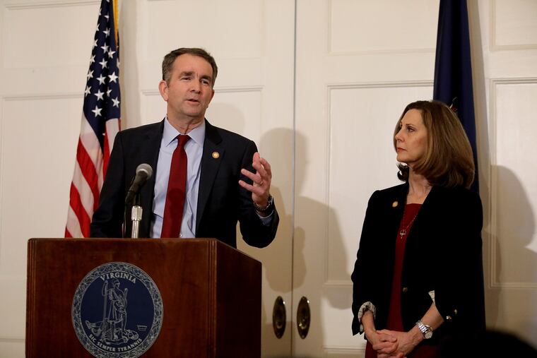 Virginia Gov. Ralph Northam, with his wife Pam at his side, said at a news conference in the Executive Mansion on Saturday, Feb. 2, 2019, that he is not the person in the racist photo in the EVMS yearbook and he will not resign.