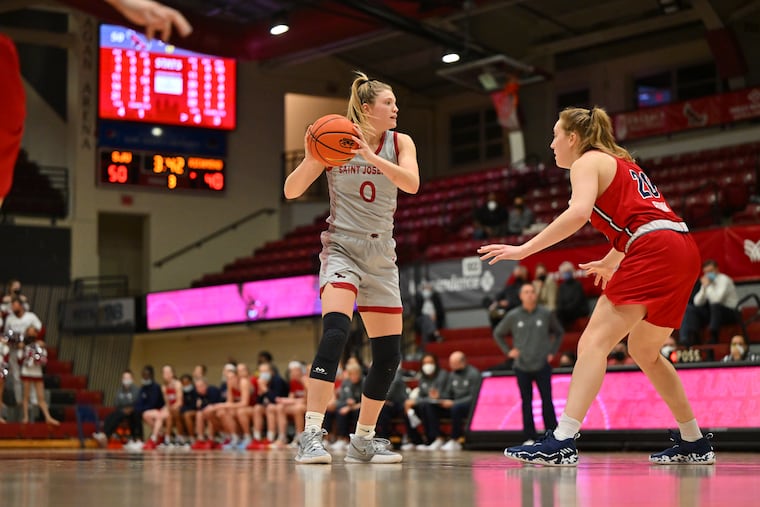 Talya Brugler, left, scored a game-high 22 points in the Hawks' season-opening win against Rider.