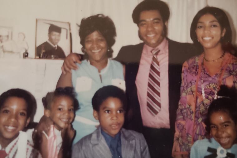 Mr. Fultz (center rear) is with wife Joyce (left rear), sister Lorna Fultz-Martin (right rear) and children (front left to right) Ronald Jr., Renae and Rodney. His niece, Traci Martin-Miller, is front right.
