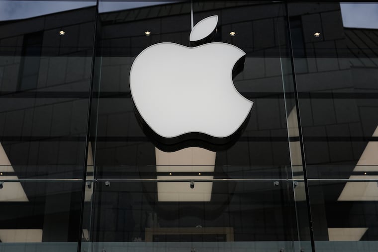 FILE - The Apple logo is illuminated at a store in Munich, April 2, 2026. Apple is getting a $2.2 billion tariff refund.