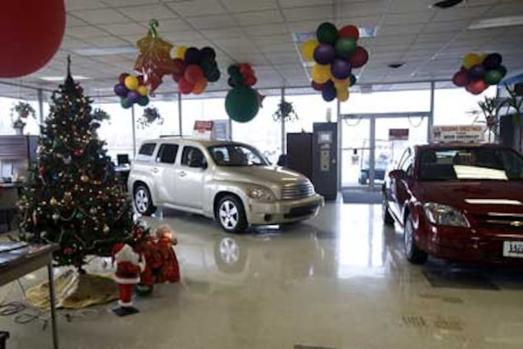 Empty showroom at Weed Chevrolet, the Bristol car dealership that is closing. Some dealers blame the downward spiral of GM and the U.S. auto industry on GMAC’s cutoff in Oct. of loans to car buyers. (Ed Hille / Staff Photographer)