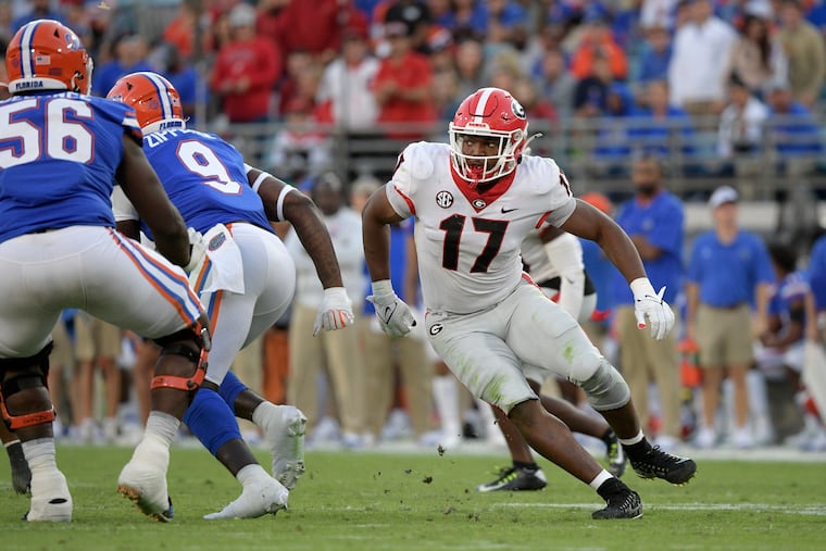 FILE- Georgia linebacker Nakobe Dean (17) follows a play during the second half of an NCAA college football game against Florida, Oct. 30, 2021, in Jacksonville, Fla. (AP Photo/Phelan M. Ebenhack)
