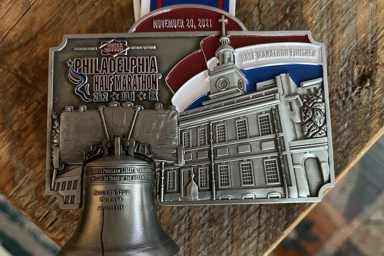 A photo of the medal given to runners in the Philadelphia Half Marathon for 2021.
